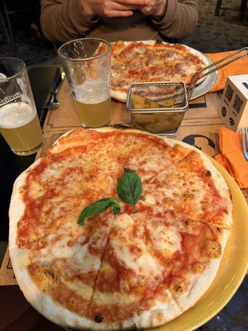 Enjoying the best freshly made pizza in Rome